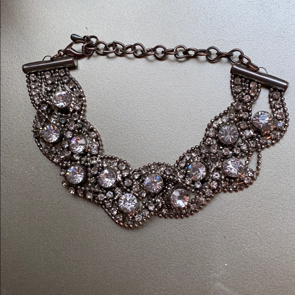 Silver bracket with rhinestones